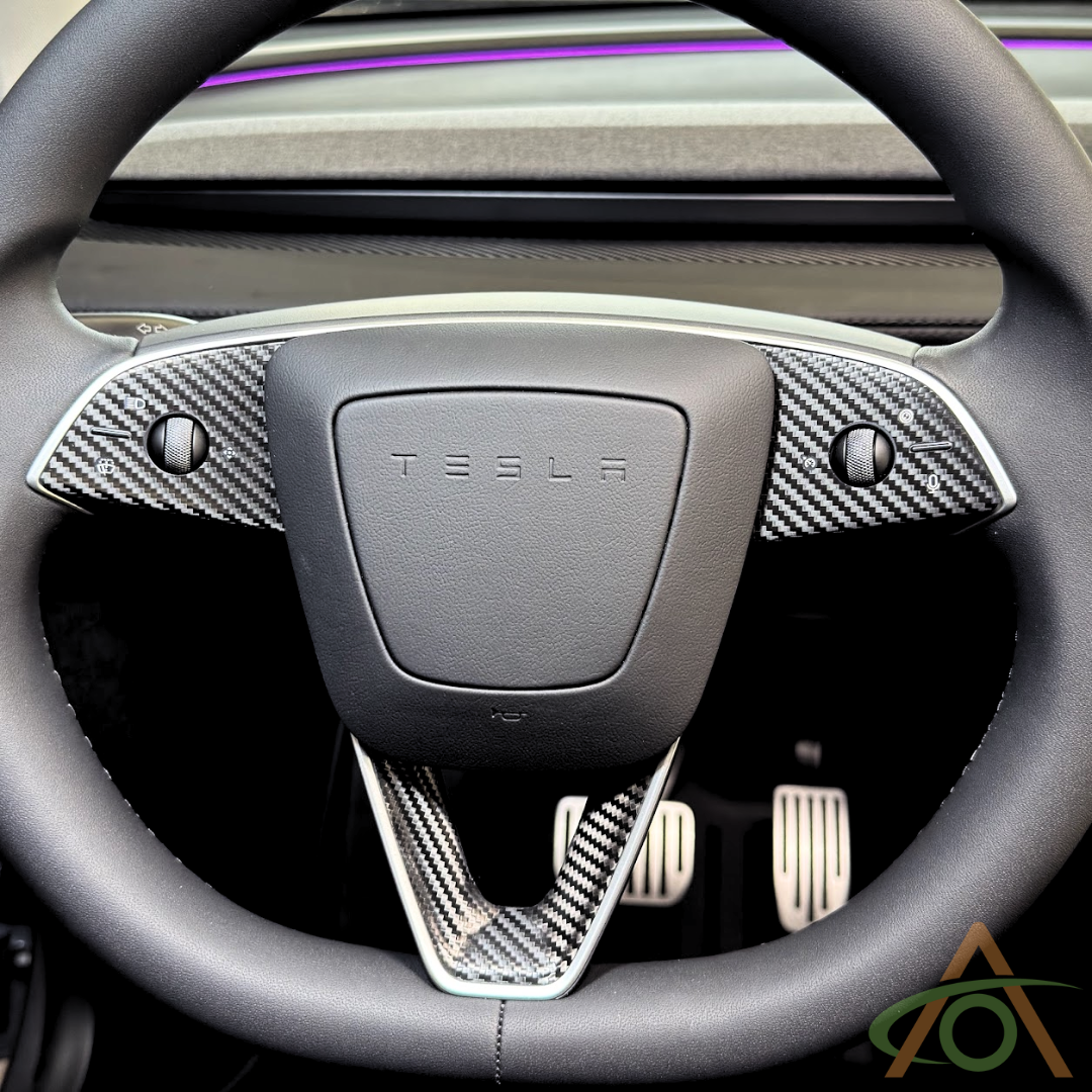 Black Carbon Fiber steering wheel decals for the Refreshed Model 3 or Y (shown on a Model Y wheel)