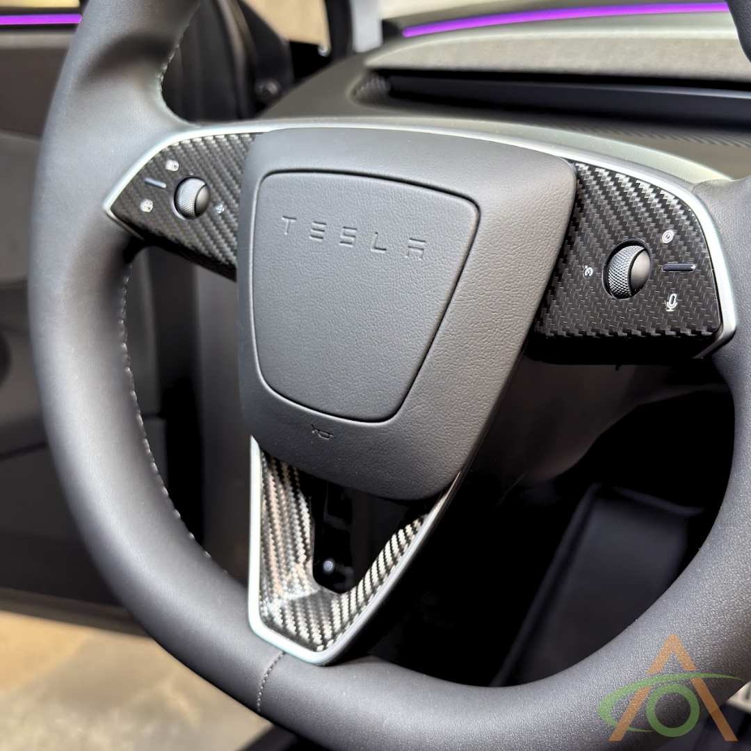 Black Carbon Fiber steering wheel decals for the Refreshed Model 3 or Y (shown on a Model Y wheel)
