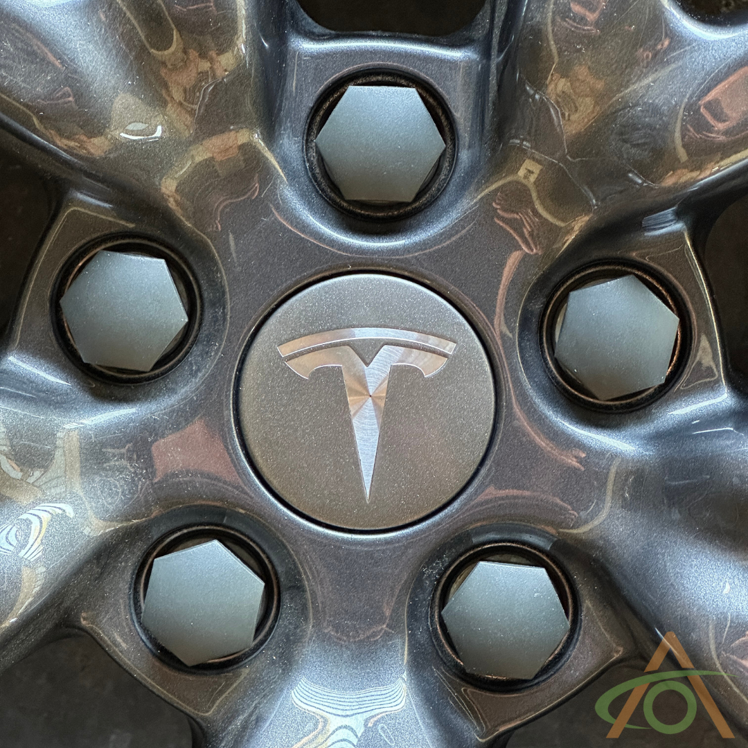 Dark Grey Wheel Center Cap for any Tesla (shown on an 18" Model 3 Wheel)