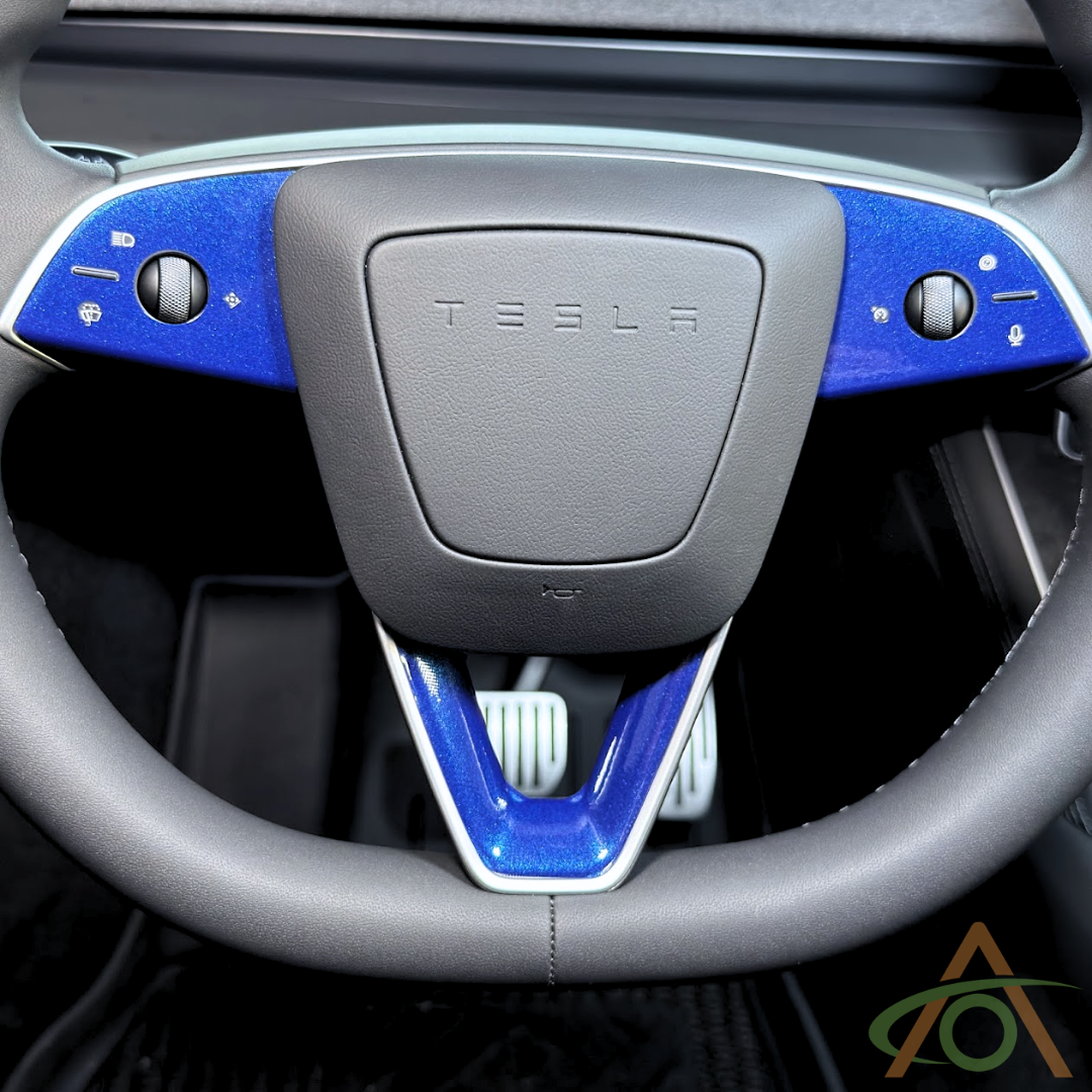 Gloss Metallic Blue steering wheel decals for the Refreshed Model 3 or Y (shown on a Model Y wheel)