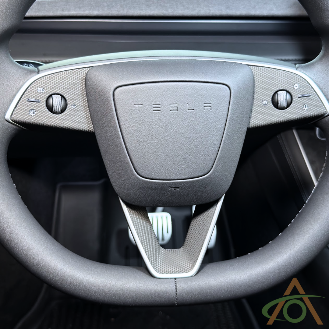 Matrix Black steering wheel decals for the Refreshed Model 3 or Y (shown on a Model Y wheel)