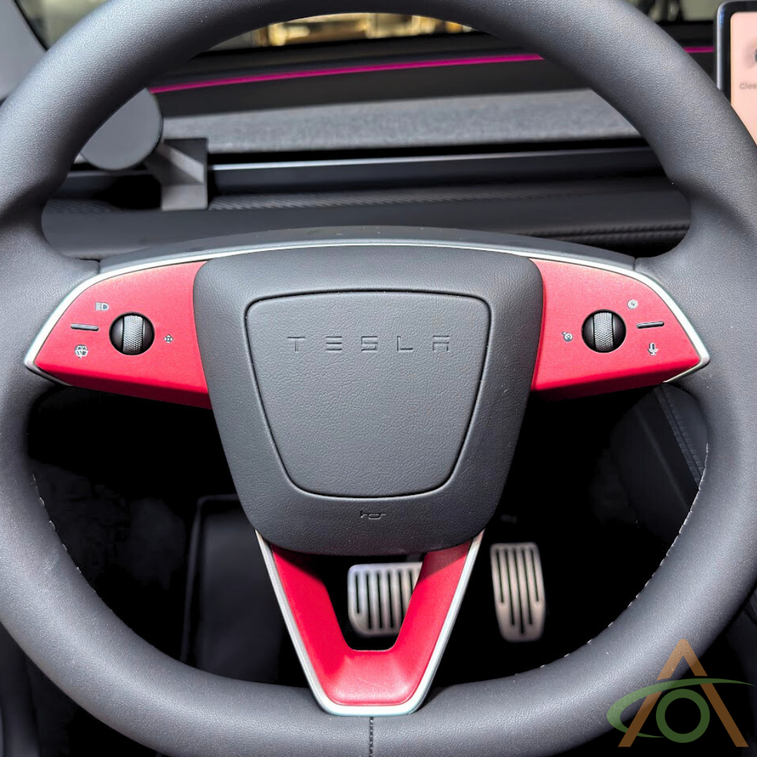 Matte Metallic Red steering wheel decals for the Refreshed Model 3 or Y (shown on a Model Y wheel)