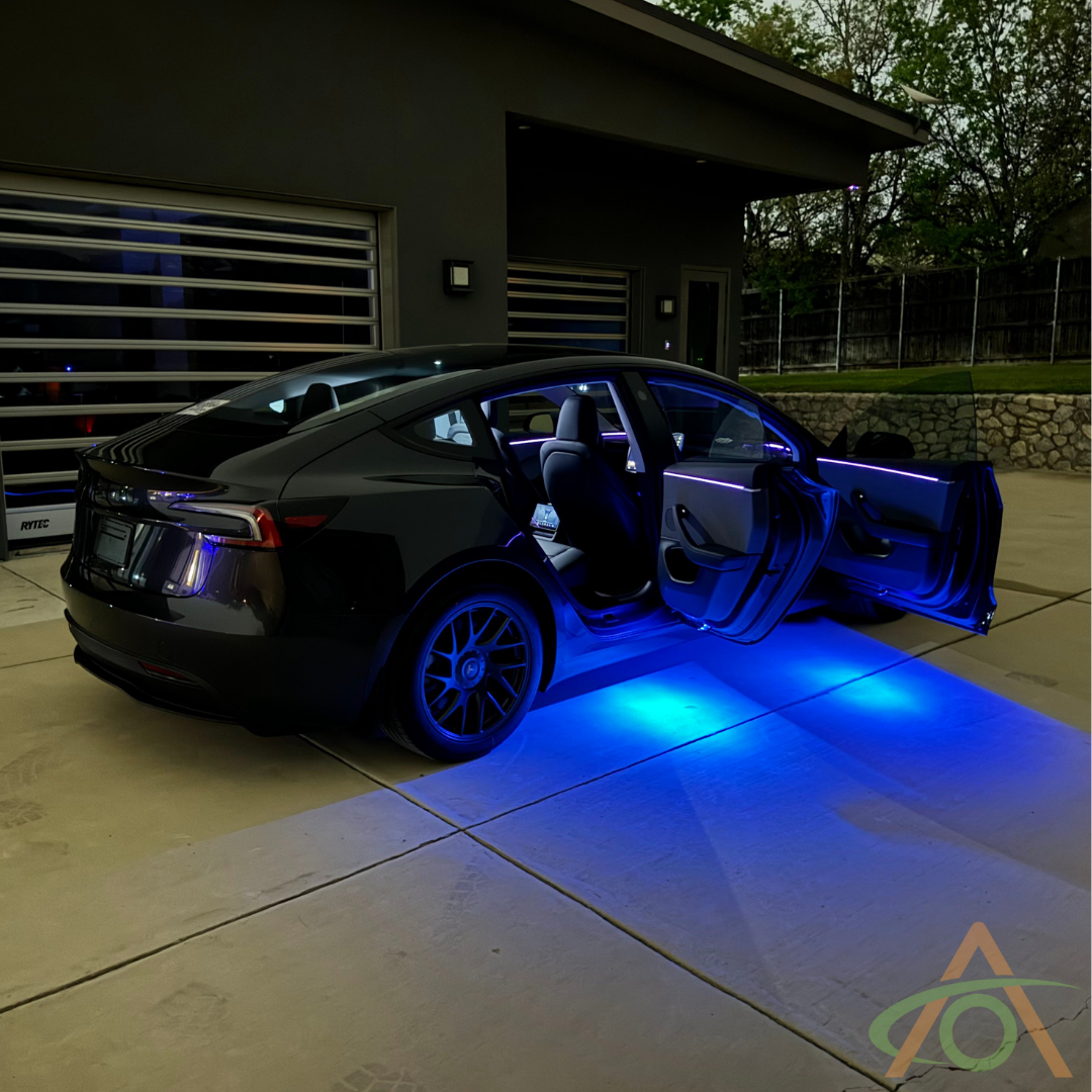 Wide shot of Blue Puddle lights (shown here in a Model 3 Highland, but same for New Model Y (Juniper)