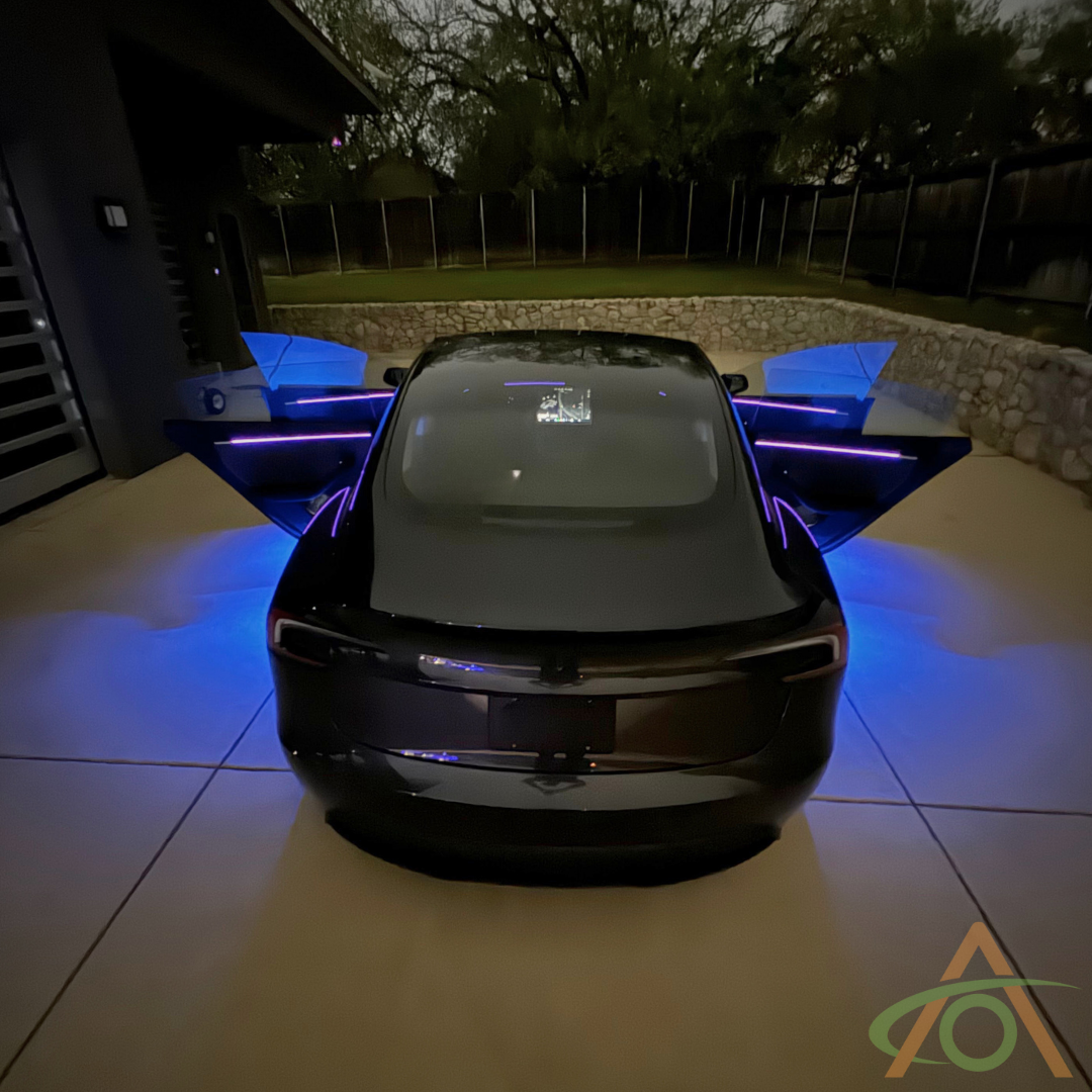 Shot at dusk, showing the blue ultrabright lights for the Refreshed Model 3 (same locations as Juniper, aside from the trunk)
