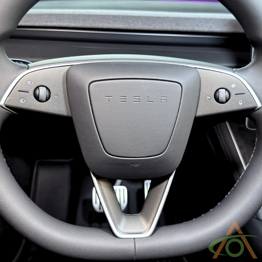 Matte Black steering wheel decals for the Refreshed Model 3 or Y (shown on a Model Y wheel)