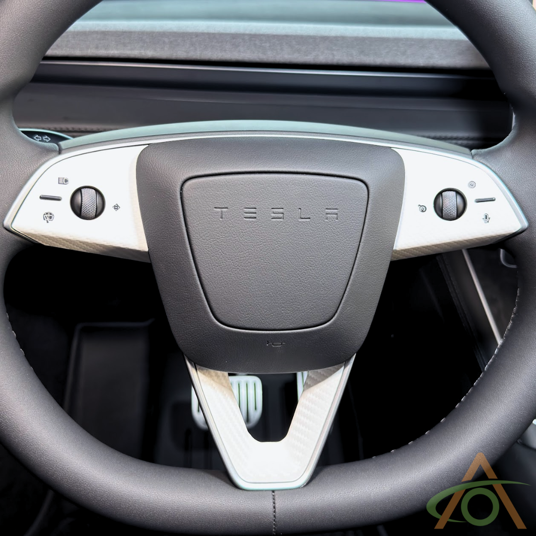 White Carbon Fiber steering wheel decals for the Refreshed Model 3 or Y (shown on a Model Y wheel)