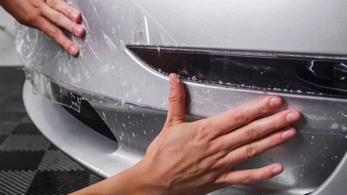 PPF being applied to a Tesla Model 3