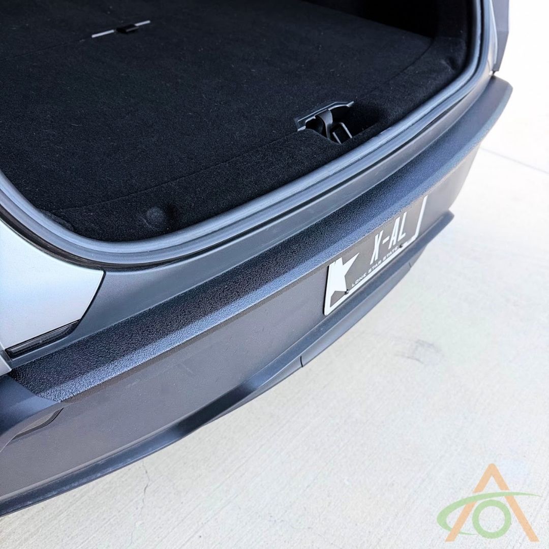 XPEL Armor rear bumper protector installed on a Refreshed Model Y (Juniper), trunk open