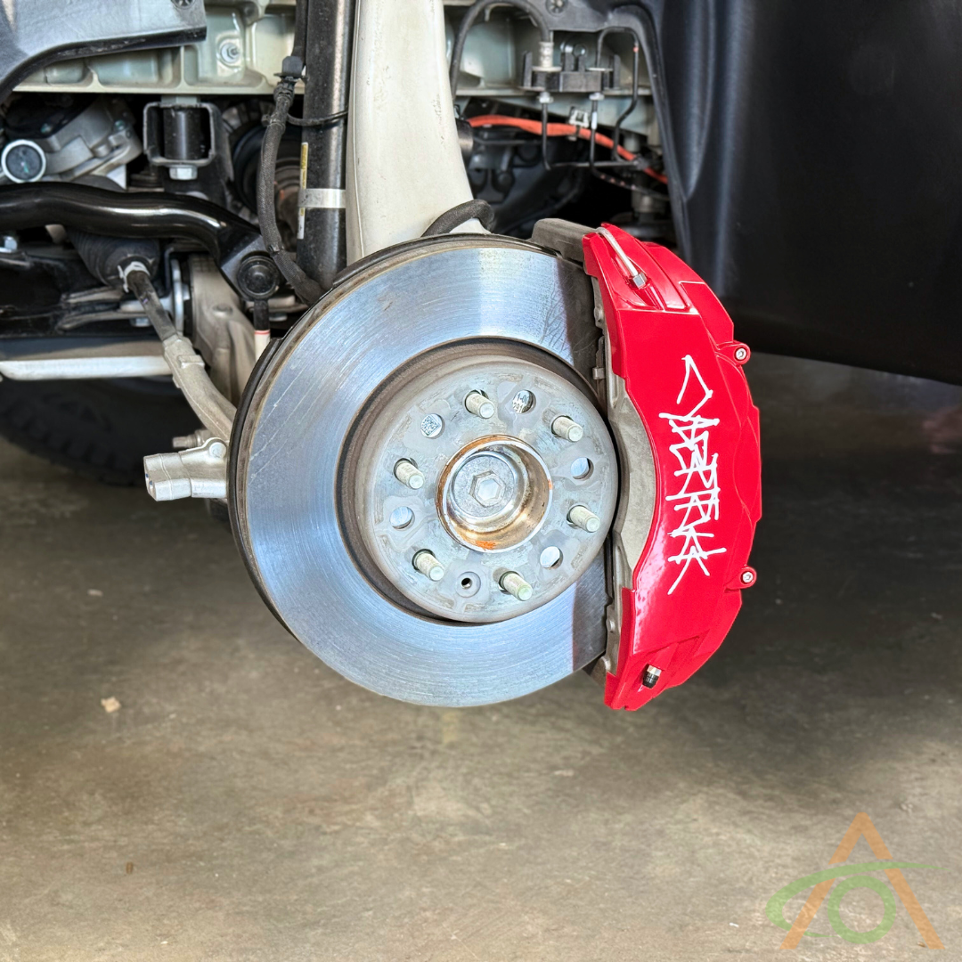 Front Premium Caliper Cover for all Cybertrucks (gloss red with graffiti decal)