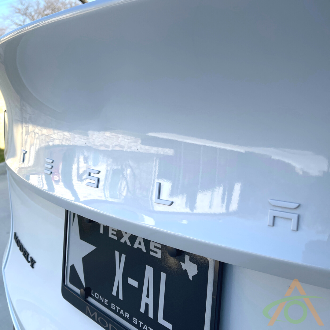 Satin White Tesla Emblem (Shown on a Model Y)